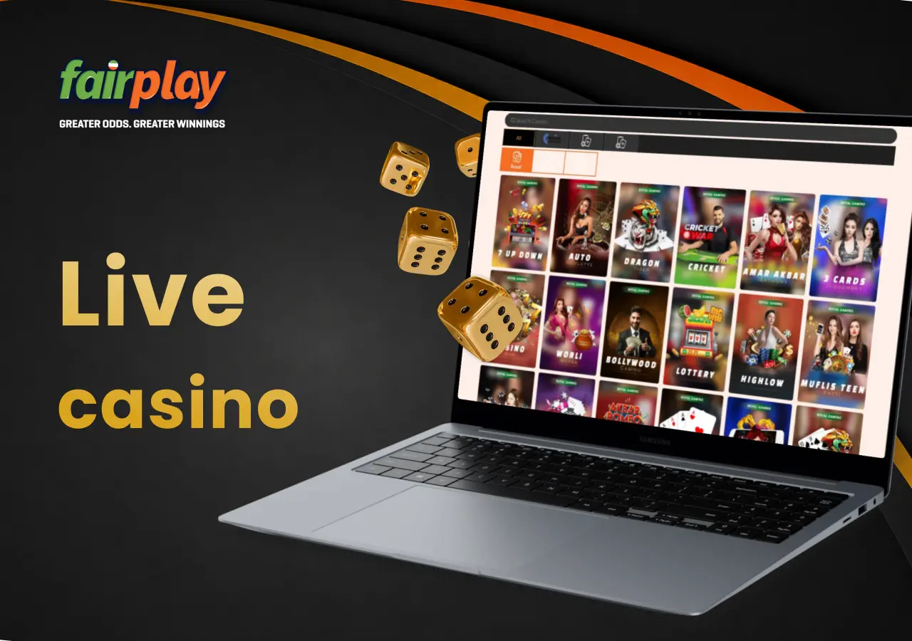 FairPlay live casino page shown on a laptop with dice positioned next to it.