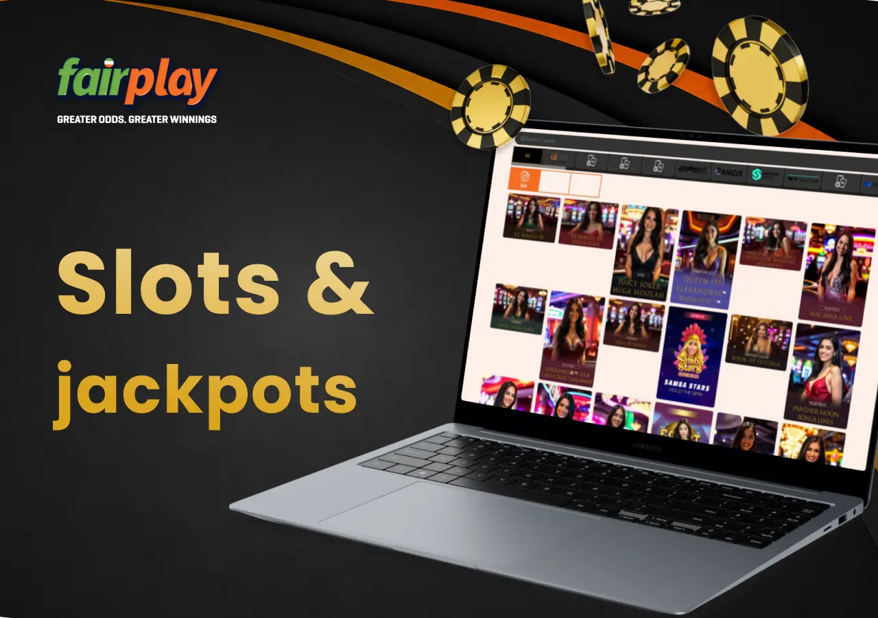 Laptop showing the fairplay slots section with casino chips placed beside the screen.